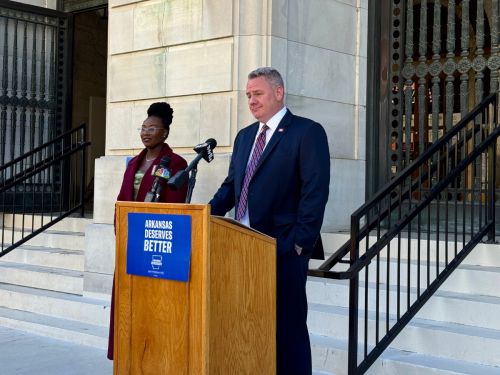 Col. Marcus Jones, Democratic Party of Arkansas Chairman, and House District 70 candidate Cordelia Smith-Johnson speak outside the Pulaski County Courthouse on Oct. 21, 2026, after filing a suit against the governor and secretary of state