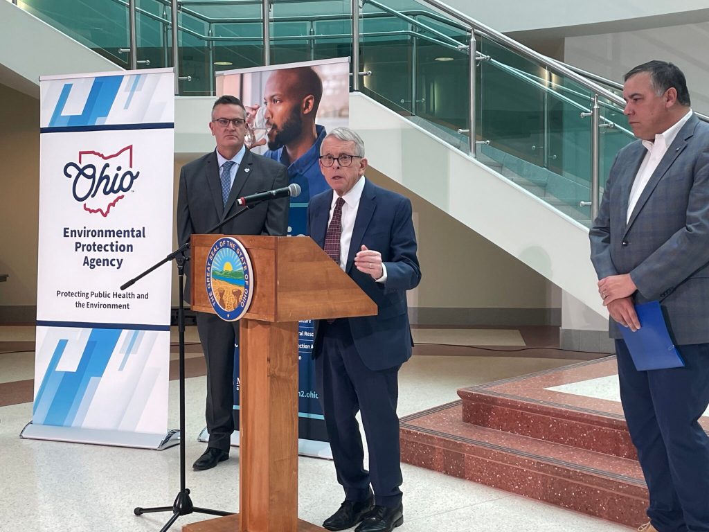 A man speaking at a podium.
